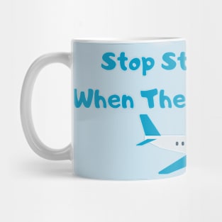 Hilarious Airplane Humor Shirt - "Stop Standing Up When The Plane Lands" Tee, Perfect Gift for Frequent Flyers & Travel Enthusiasts Mug